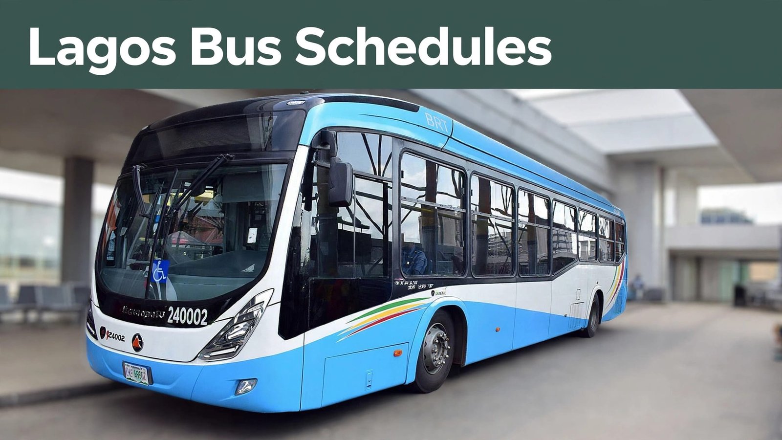 Blue-and-white Lagos BRT bus waiting at a terminal with the driver visible.