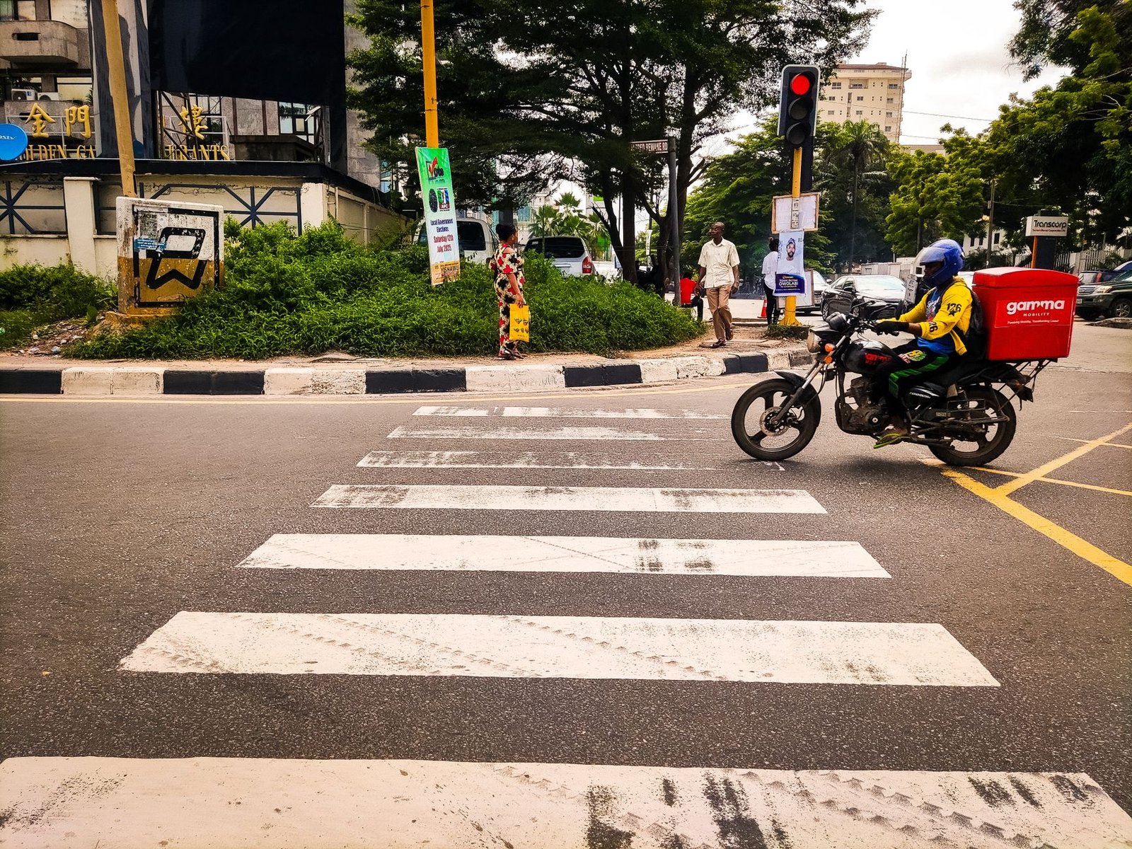 Delivery motorbike on a busy Lagos street