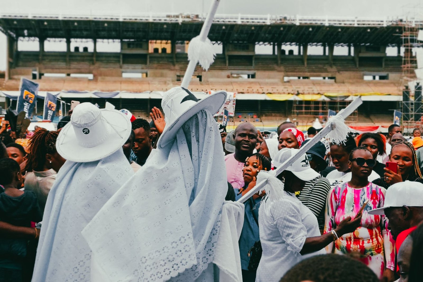 Cultural festival in Lagos, Nigeria with people in traditional attire and crowds celebrating