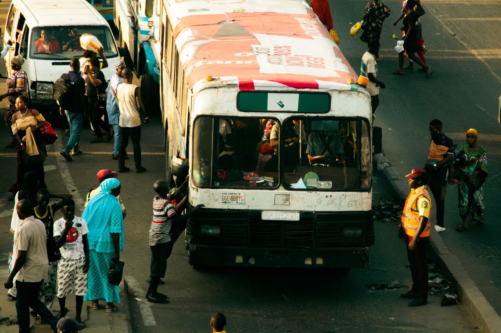 A bustling street in Lagos, Nigeria, capturing daily life and transportation activities
