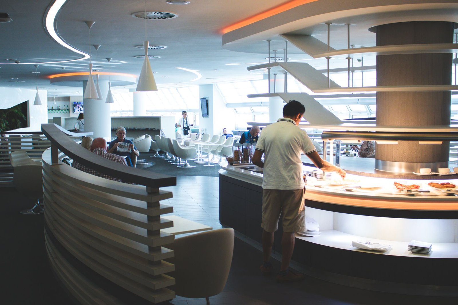 Stylish airport lounge with buffet and seating area