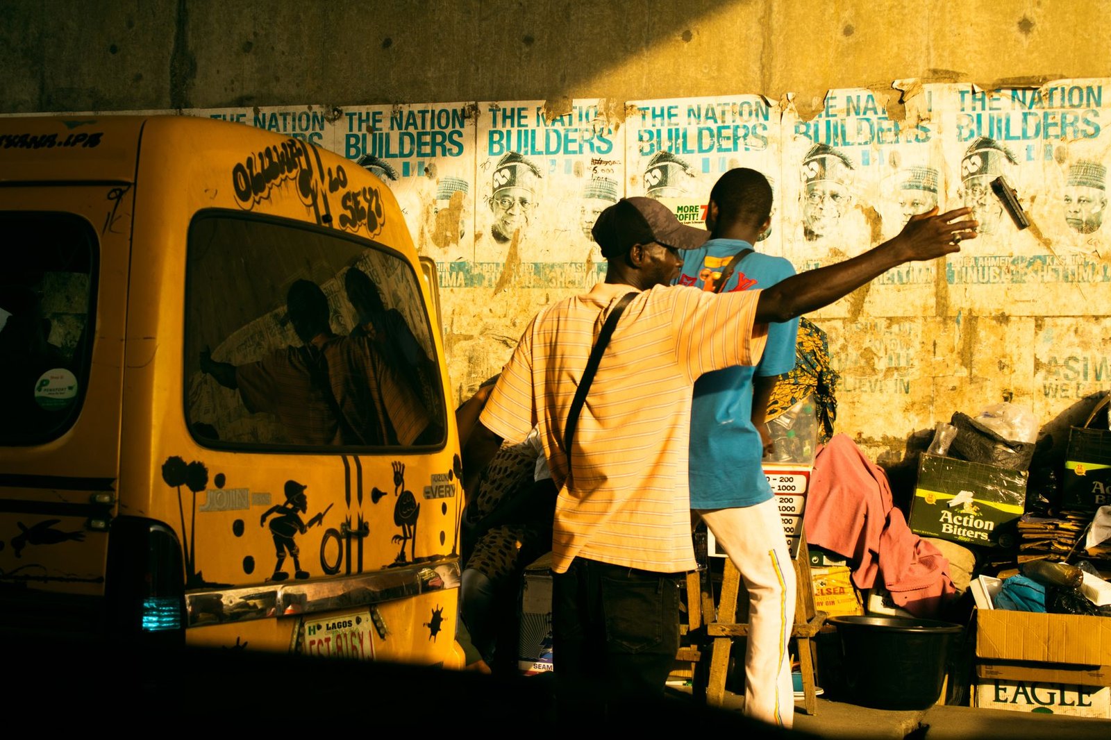 Lagos street at golden hour with danfo bus and commuters